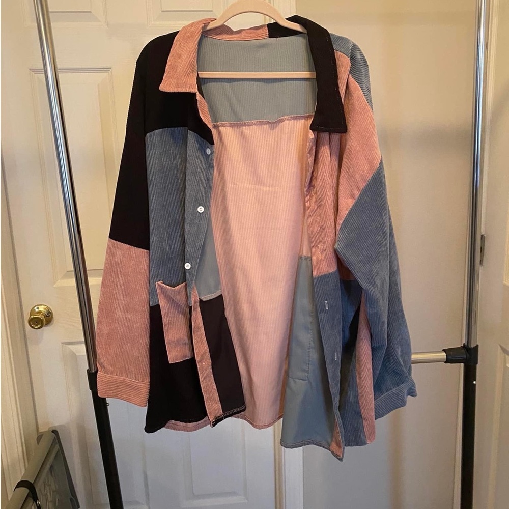 Pink blue and black button up jacket